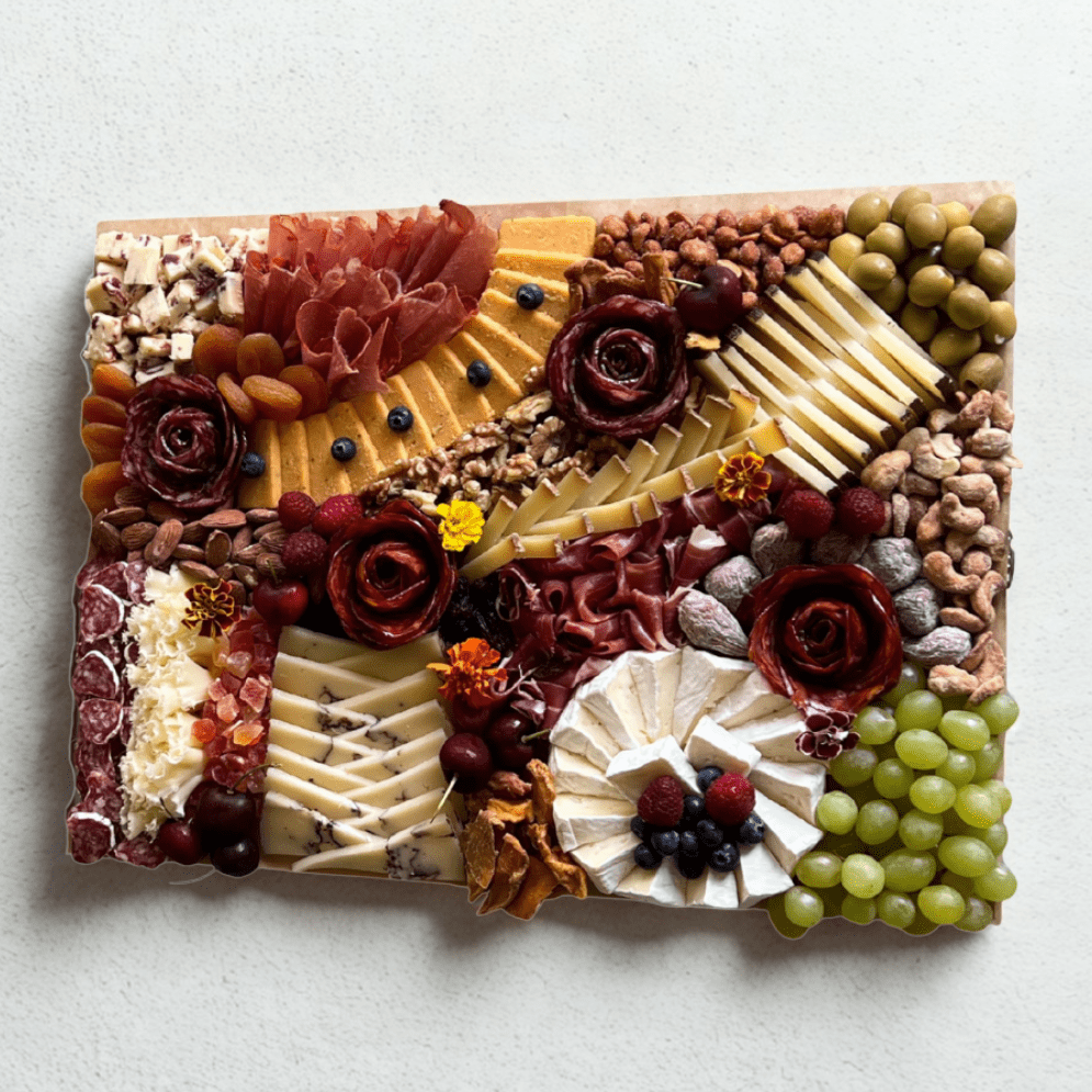 Tabla de quesos e ibericos para cenas familiares